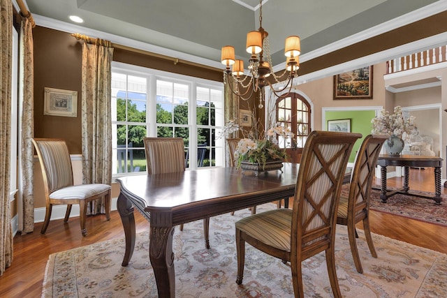 3285 Blazer Rd, Franklin, TN 37064 - dining area with a chandelier, crown molding, and wood finished floors