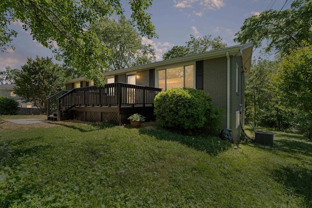 104 Dolphus Dr, Hendersonville, TN 37075 - view of front of property with a front lawn, a deck, and central air condition unit