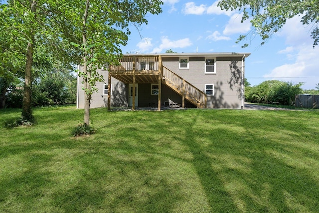 104 Dolphus Dr, Hendersonville, TN 37075 - rear view of house featuring stairs, a deck, and a lawn
