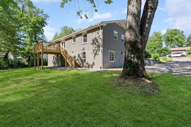 104 Dolphus Dr, Hendersonville, TN 37075 - rear view of property with stairway, a deck, and a yard
