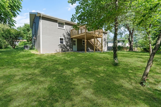 104 Dolphus Dr, Hendersonville, TN 37075 - rear view of house featuring stairs, a deck, a yard, and brick siding