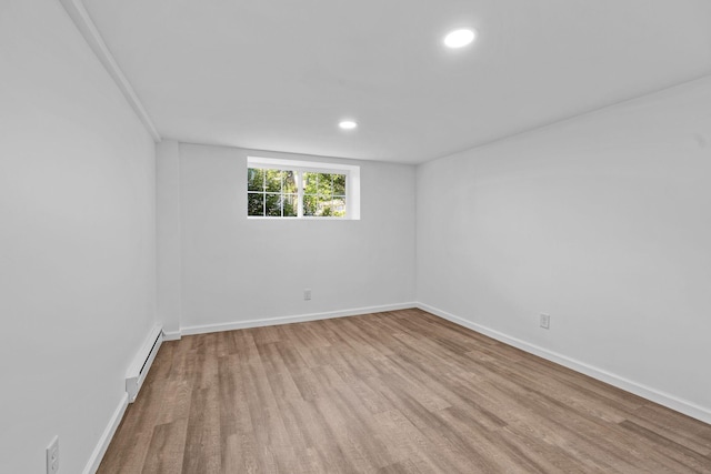 104 Dolphus Dr, Hendersonville, TN 37075 - spare room featuring baseboard heating, wood finished floors, recessed lighting, and baseboards