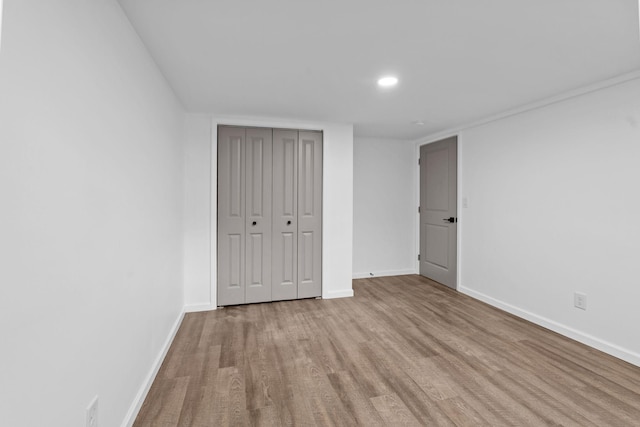 104 Dolphus Dr, Hendersonville, TN 37075 - unfurnished bedroom with wood finished floors, baseboards, a closet, and recessed lighting