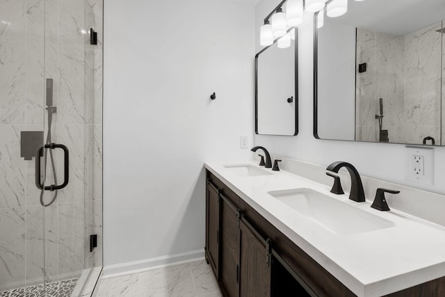 104 Dolphus Dr, Hendersonville, TN 37075 - full bathroom featuring marble look tile flooring, baseboards, a marble finish shower, and double vanity
