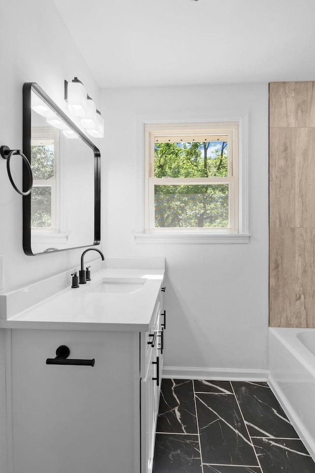 104 Dolphus Dr, Hendersonville, TN 37075 - bathroom with vanity, marble finish flooring, and baseboards