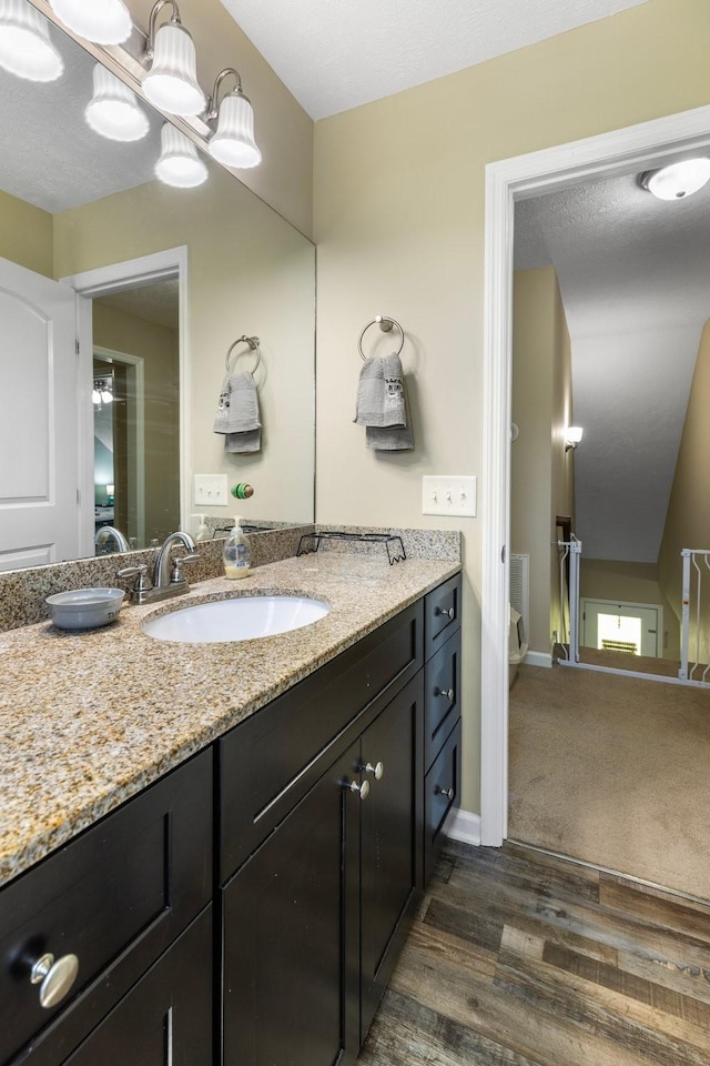 1710 Collins Hollow Rd, Lewisburg, TN 37091 - bathroom with wood finished floors, vanity, and baseboards