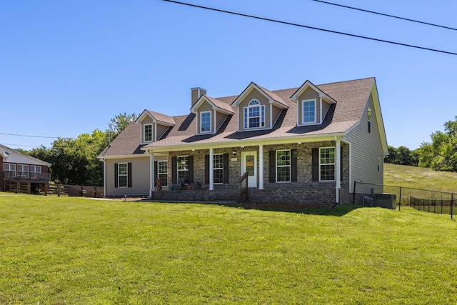 1710 Collins Hollow Rd, Lewisburg, TN 37091 - cape cod house featuring a chimney, a porch, central AC, and brick siding