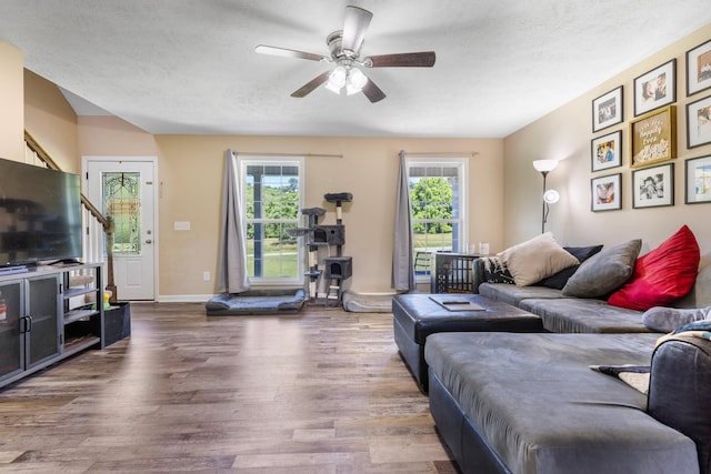 1710 Collins Hollow Rd, Lewisburg, TN 37091 - living room with wood finished floors, baseboards, a ceiling fan, stairway, and a textured ceiling