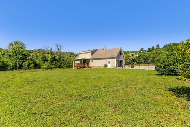 1710 Collins Hollow Rd, Lewisburg, TN 37091 - view of grassy yard featuring a deck, stairs, and a wooded view