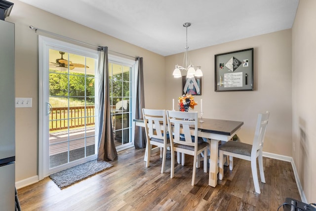 1710 Collins Hollow Rd, Lewisburg, TN 37091 - dining area with wood finished floors, baseboards, and a chandelier