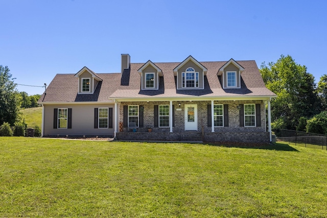 1710 Collins Hollow Rd, Lewisburg, TN 37091 - cape cod-style house featuring a chimney, a porch, and brick siding