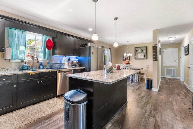 1710 Collins Hollow Rd, Lewisburg, TN 37091 - kitchen with stainless steel appliances, a sink, plenty of natural light, and wood finished floors