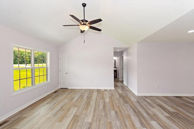 1161 Honey Ln, Estill Springs, TN 37330 - empty room with light wood finished floors, ceiling fan, and lofted ceiling