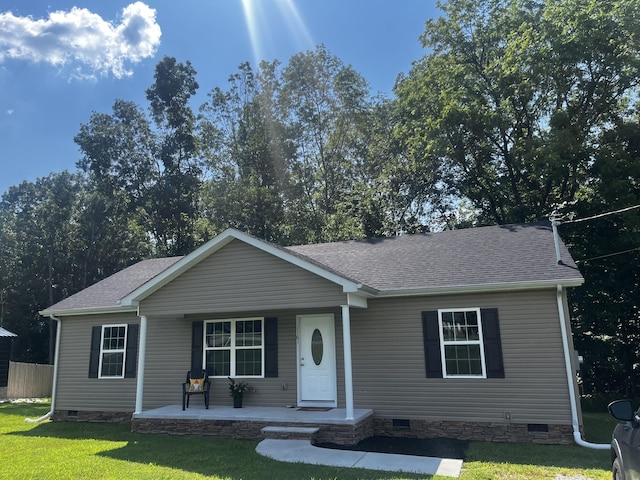 1161 Honey Ln, Estill Springs, TN 37330 - view of front of house with crawl space, covered porch, a front yard, and roof with shingles