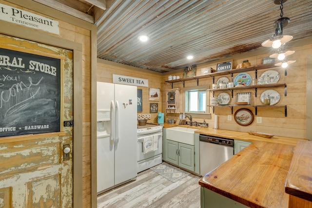 1930 Preacher Holt Rd, Mount Pleasant, TN 38474 - kitchen with white appliances, wooden counters, open shelves, a sink, and light wood-style flooring