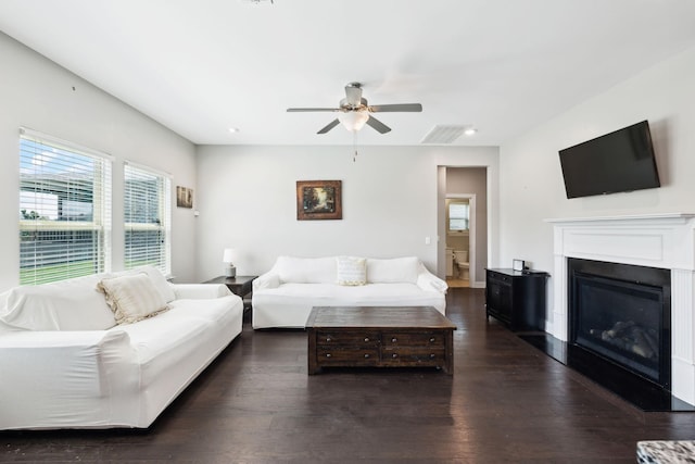 633 Fall Creek Cir, Goodlettsville, TN 37072 - living room with a ceiling fan, dark wood-style flooring, a glass covered fireplace, and recessed lighting