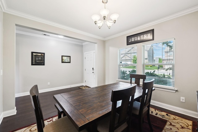 633 Fall Creek Cir, Goodlettsville, TN 37072 - dining area featuring a chandelier, dark wood-type flooring, ornamental molding, and baseboards