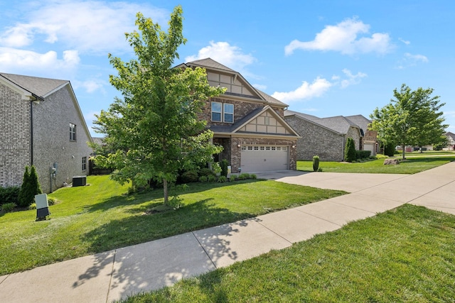 633 Fall Creek Cir, Goodlettsville, TN 37072 - view of front of home with central AC unit, concrete driveway, and a front yard