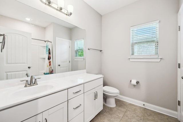 633 Fall Creek Cir, Goodlettsville, TN 37072 - full bath featuring vanity, toilet, baseboards, curtained shower, and tile patterned floors