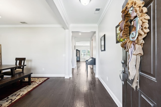 633 Fall Creek Cir, Goodlettsville, TN 37072 - foyer entrance featuring dark wood finished floors, ornamental molding, and baseboards