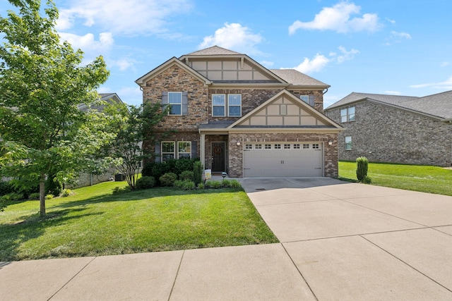 633 Fall Creek Cir, Goodlettsville, TN 37072 - craftsman-style home with concrete driveway, a front yard, and brick siding