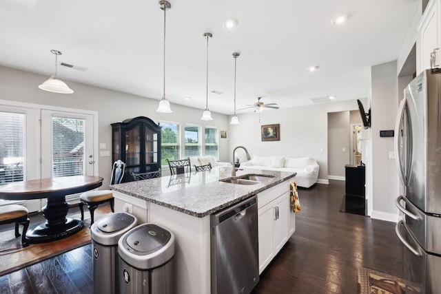 633 Fall Creek Cir, Goodlettsville, TN 37072 - kitchen featuring stainless steel appliances, a sink, open floor plan, dark wood-style flooring, and recessed lighting