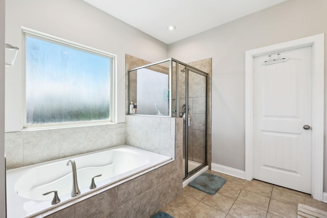 633 Fall Creek Cir, Goodlettsville, TN 37072 - bathroom featuring a bath, a shower stall, and tile patterned flooring
