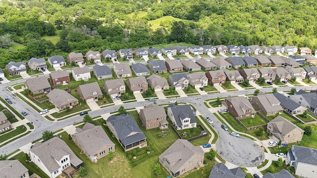 633 Fall Creek Cir, Goodlettsville, TN 37072 - aerial view of property and surrounding area featuring nearby suburban area and a heavily wooded area