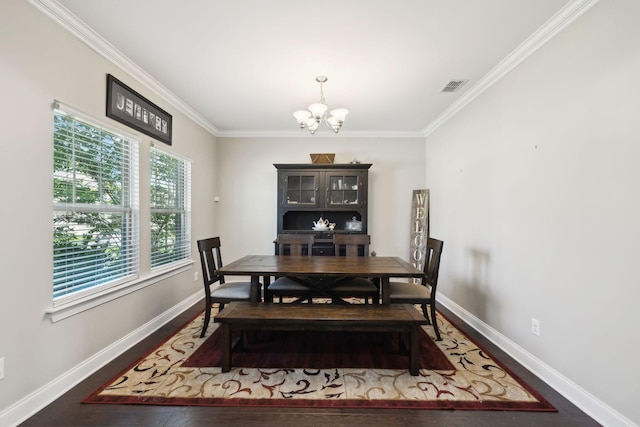 633 Fall Creek Cir, Goodlettsville, TN 37072 - dining room featuring a chandelier, crown molding, baseboards, and wood finished floors