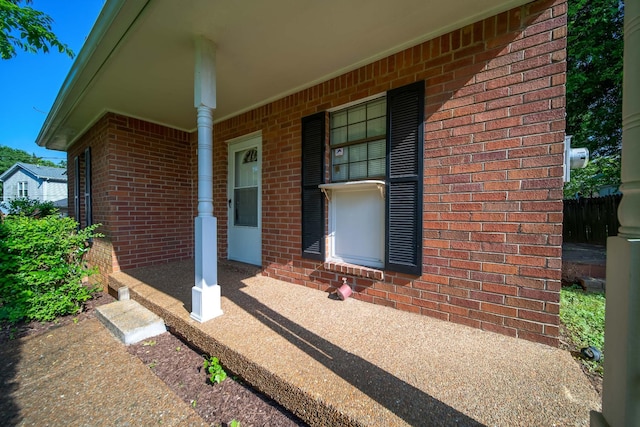 504 Macfie Ct, Madison, TN 37115 - doorway to property with brick siding and a porch