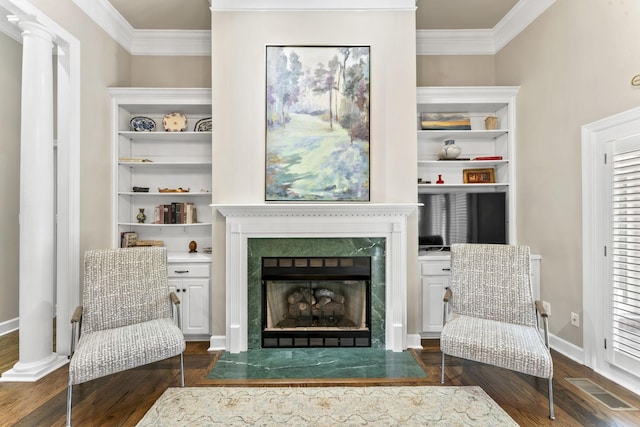 3000 General Forrest Dr, Columbia, TN 38401 - living area featuring ornamental molding, dark wood-type flooring, baseboards, and a fireplace