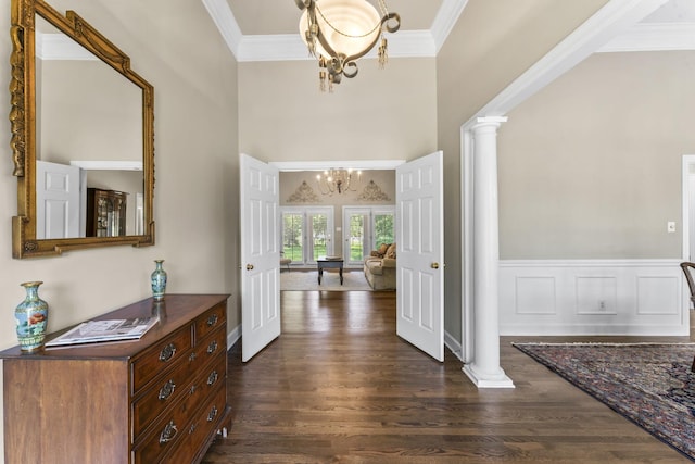 3000 General Forrest Dr, Columbia, TN 38401 - entryway featuring a chandelier, ornate columns, dark wood finished floors, ornamental molding, and a towering ceiling