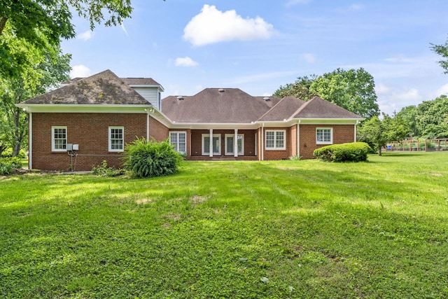 3000 General Forrest Dr, Columbia, TN 38401 - rear view of property with brick siding and a yard