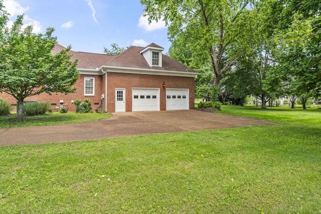 3000 General Forrest Dr, Columbia, TN 38401 - view of side of property featuring an attached garage, concrete driveway, a yard, brick siding, and a shingled roof