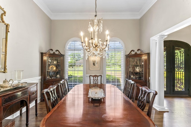 3000 General Forrest Dr, Columbia, TN 38401 - dining space featuring wood finished floors, a chandelier, ornamental molding, and ornate columns