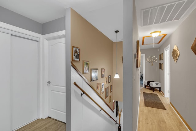 3109 Stokers Ln, Nashville, TN 37218 - hallway featuring attic access and light wood-style flooring