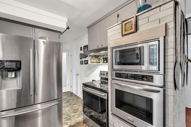 3109 Stokers Ln, Nashville, TN 37218 - kitchen with appliances with stainless steel finishes, under cabinet range hood, gray cabinetry, and dark stone finish flooring