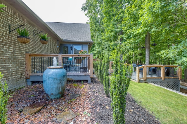 105 Andrews Dr, Loretto, TN 38469 - view of grassy yard featuring a deck