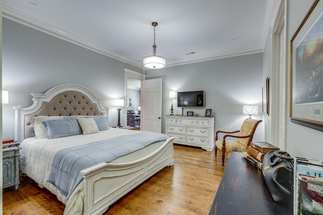 105 Andrews Dr, Loretto, TN 38469 - bedroom with crown molding and light wood-style flooring