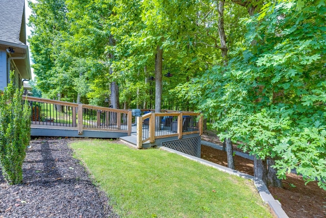 105 Andrews Dr, Loretto, TN 38469 - view of green lawn with a deck