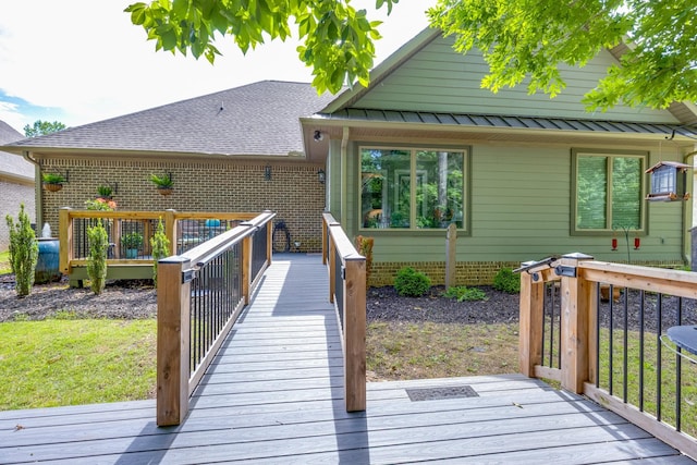 105 Andrews Dr, Loretto, TN 38469 - back of house with a deck and metal roof