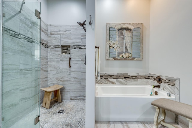 105 Andrews Dr, Loretto, TN 38469 - full bathroom featuring a garden tub and a shower stall