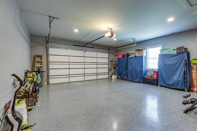 105 Andrews Dr, Loretto, TN 38469 - garage featuring recessed lighting and a garage door opener