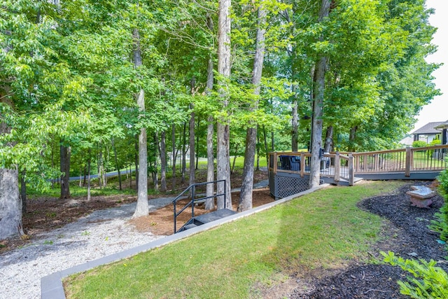 105 Andrews Dr, Loretto, TN 38469 - view of grassy yard featuring a deck