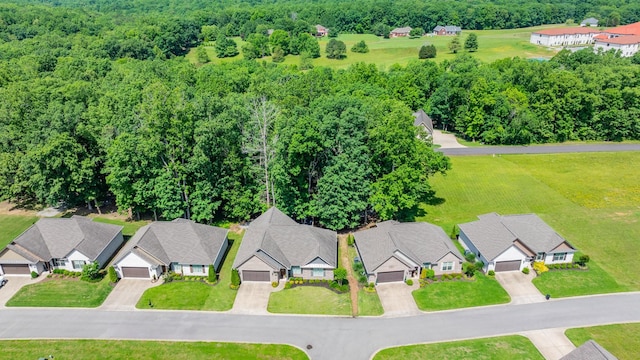 105 Andrews Dr, Loretto, TN 38469 - aerial perspective of suburban area featuring a forest