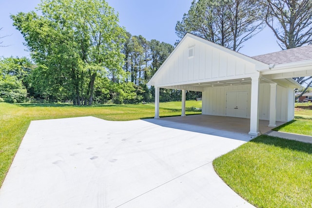 110 4th Ave S, Loretto, TN 38469 - view of patio / terrace featuring a carport and driveway