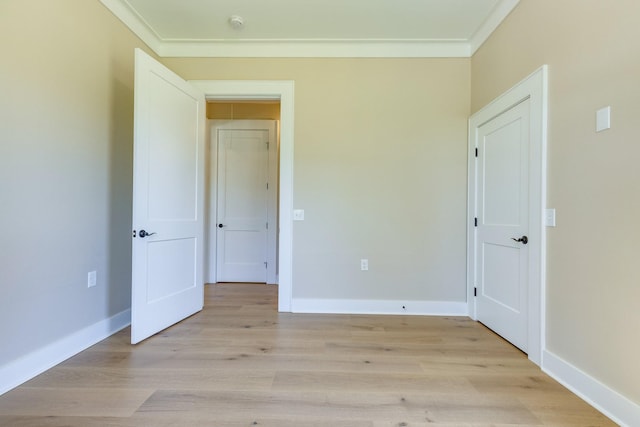 110 4th Ave S, Loretto, TN 38469 - spare room featuring ornamental molding, light wood finished floors, and baseboards