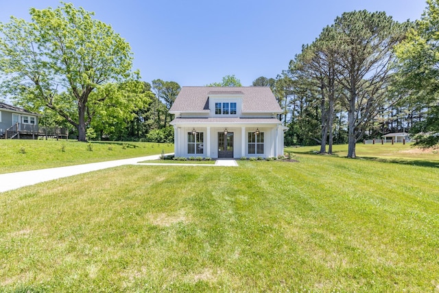 110 4th Ave S, Loretto, TN 38469 - view of front of home featuring a front lawn and covered porch