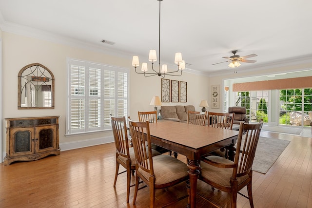 565 Scout Dr, Mount Juliet, TN 37122 - dining space featuring light wood-style flooring, ornamental molding, a chandelier, ceiling fan, and baseboards