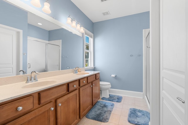 565 Scout Dr, Mount Juliet, TN 37122 - full bath featuring a stall shower, double vanity, tile patterned flooring, baseboards, and toilet